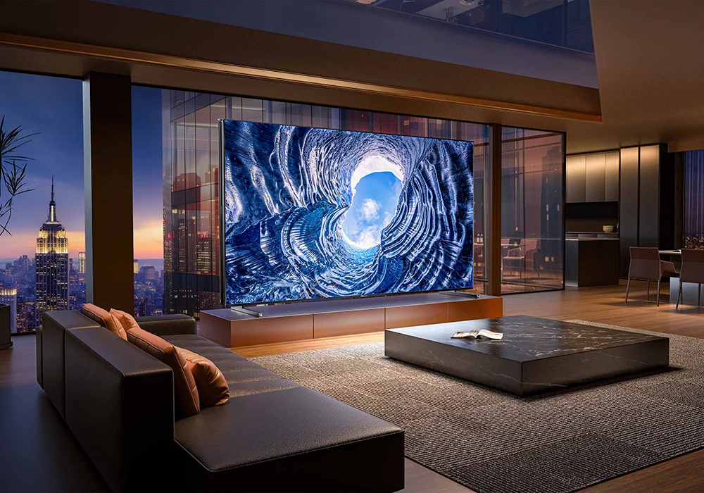 Hisense smart TV in a luxury living room with abstract display and city skyline view - premium home entertainment meets modern interior design.