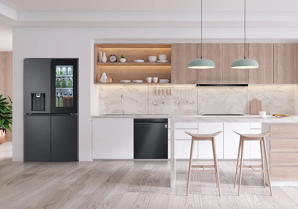 Matte black LG quad-door fridge in a modern Scandi style kitchen with marble counters and splashback, white cabinets, and wooden bar stools.