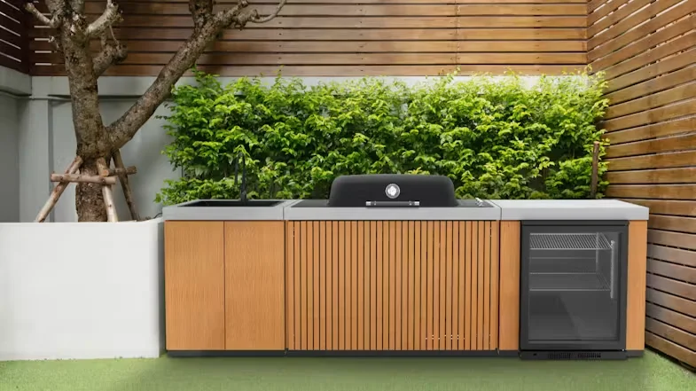Everdure 3 Burner Outdoor BBQ Kitchen in a modern backyard