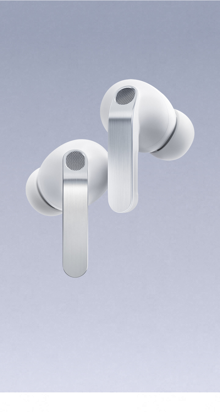 'A pair of white Galaxy Buds4 Pro hover with the left earbud slightly lower than the right.